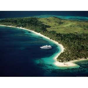  Aerial of Blue Lagoon Cruises Ship Anchored Off Island 