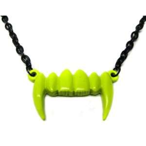    Neon Yellow Dracula Vampire Teeth Fang Necklace Toys & Games