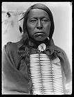 Flying Hawk,American Indian,wearing breastplate,c1​900