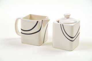   days this unique stoneware sugar and creamer set will serve you well