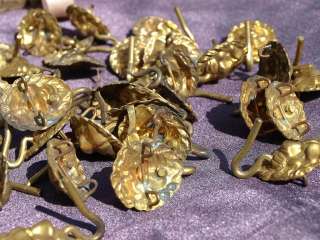 This is a delightful lot of 32 French ormolu bronze lion head hooks