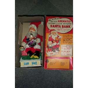   Trim A Tree Deluxe Animated Battery and Coin Santa Bank: Toys & Games