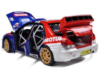 Brand new 1:18 scale diecast model car of Subaru Impreza WRC07 #16 F 