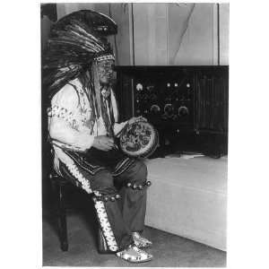  Chief Little Bear seated by radio, Coliseum at Chicago 