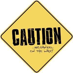   CAUTION  MCDANIEL ON THE WAY  CROSSING SIGN