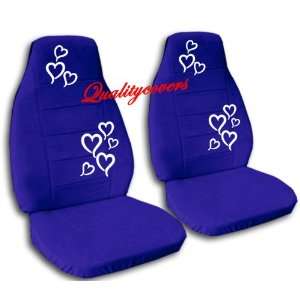  2 dark blue car seat covers with white hearts for a 2002 