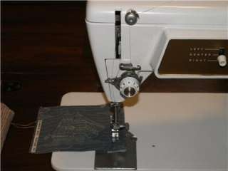  603 Sewing Machine w/ Wood Cabinet, Stool, Manual & Attachments  