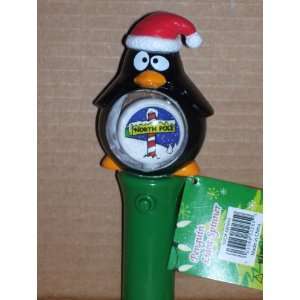  CHRISTMAS NORTH POLE PENGUIN LIGHT SPINNER: Toys & Games