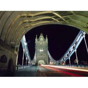 Night Time Traffic Crosses Tower Bridge in Central London 