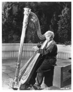 HARPO MARX great 8x10 still playing harp (b649)  