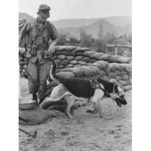 US Marine on Cap Helping Defend S. Vietnamese Village Setting Out on 